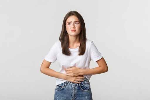 Woman Suffering From Stomach Pain